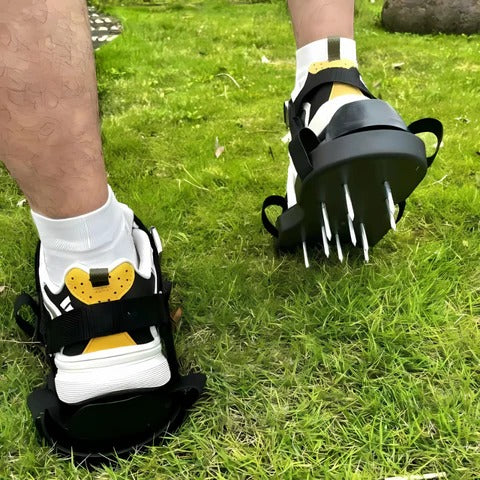 Close-up of durable aerator lawn shoes, featuring sturdy spikes for effective soil aeration, promoting grass health & yard maintenance.