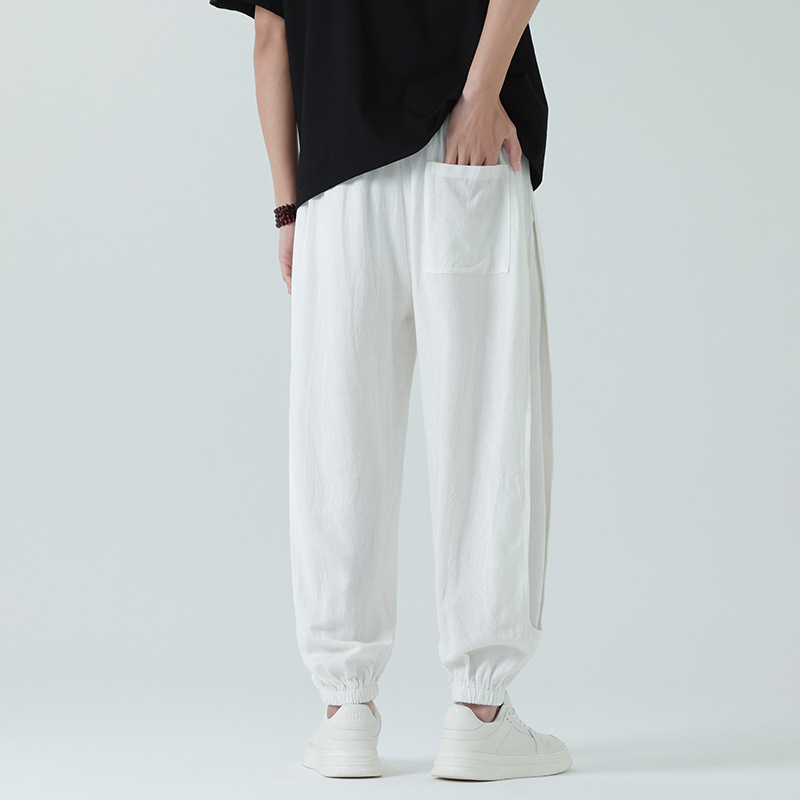 Model wearing relaxed fit unisex Airdrifter joggers. Lightweight & comfortable for everyday casual or active use.