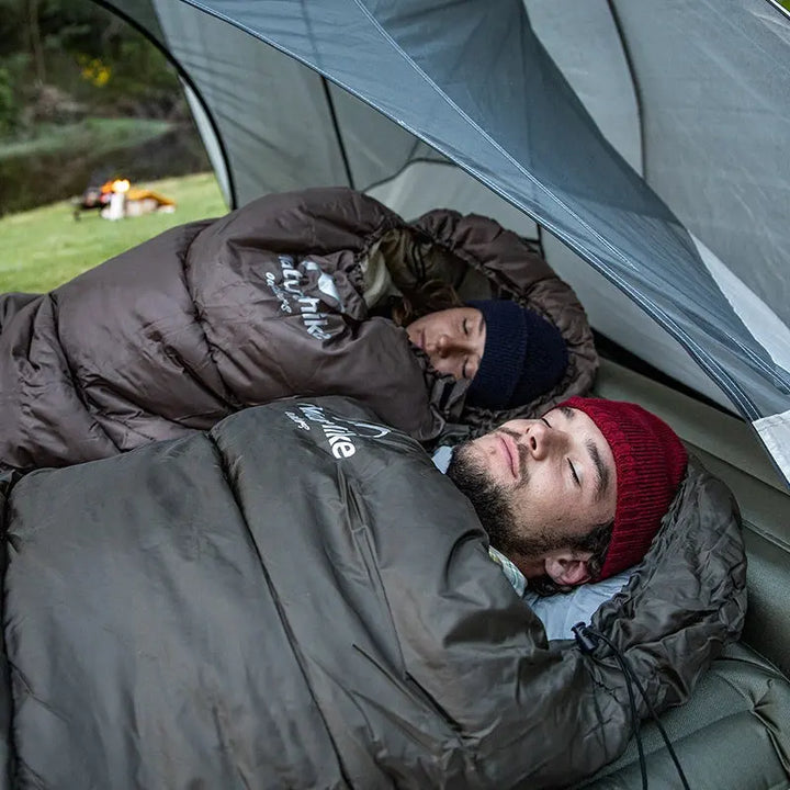 AlpineTrail insulated mummy sleeping bag, perfect for cold weather camping. Essential outdoor gear for warmth & comfort.