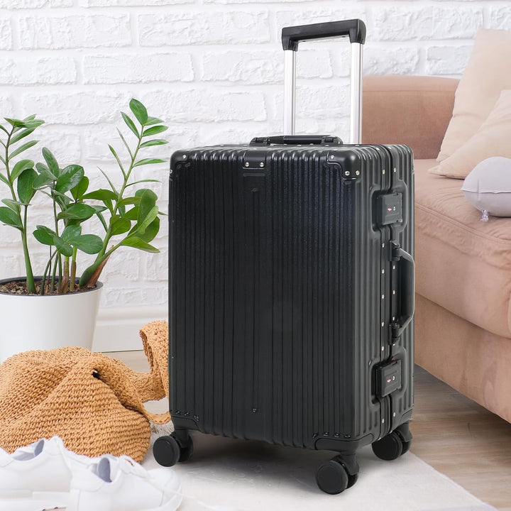 Airport essential: Black aluminum carry-on suitcase. Hardside, TSA lock, spinner wheels. Durable & secure for unisex travel.