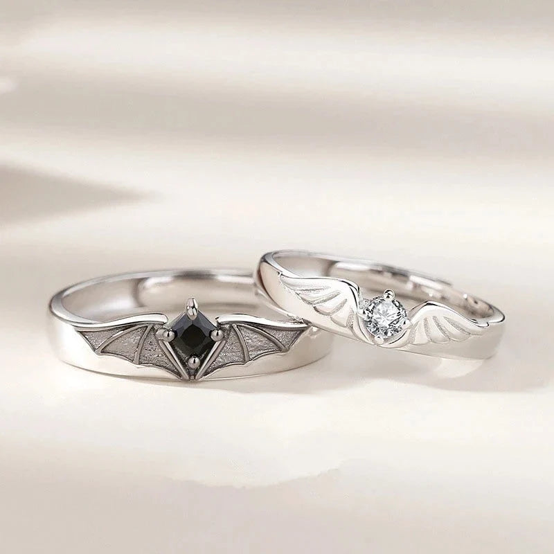 Unisex Angel and Demon couple ring set, symbolic of balance. Adjustable, crystal, nontarnish for lasting wear.