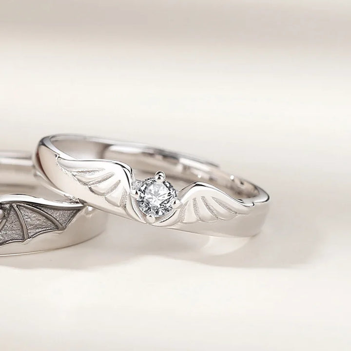 Elegant Angel and Demon statement rings for couples, showcasing detailed motifs. Adjustable, nontarnish, crystal accents.