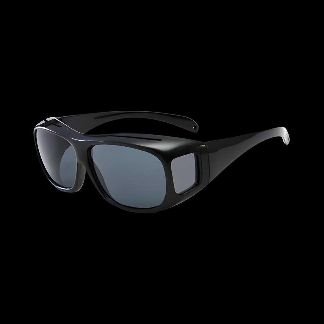 Anti-glare night driving eyewear designed to fit comfortably over prescription glasses.