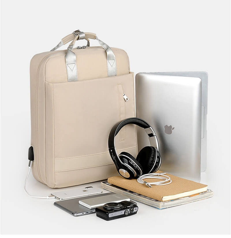 Versatile anti-theft daypack with smart organization, hidden zippers, & an external USB port.
