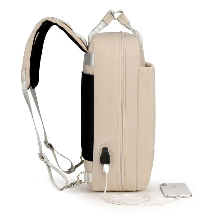 Modern anti-theft laptop backpack with multiple organizer pockets & external USB port.