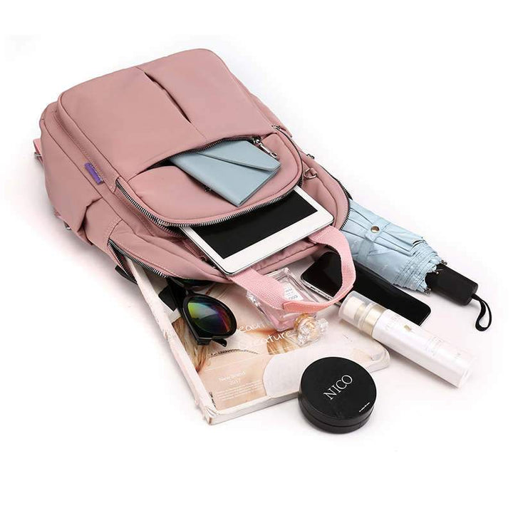 Interior of the multi-compartment anti-theft laptop bag, showing organized storage for tech & essentials.