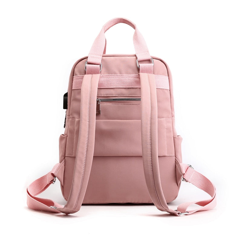 Dedicated laptop compartment within the anti-theft school backpack, offering secure & padded storage.