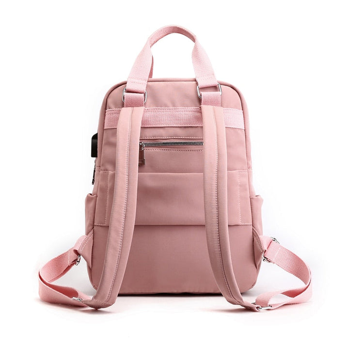 Dedicated laptop compartment within the anti-theft school backpack, offering secure & padded storage.