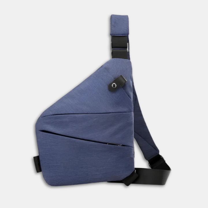 Person wearing a black anti-theft travel sling bag across their chest, hands-free & secure.