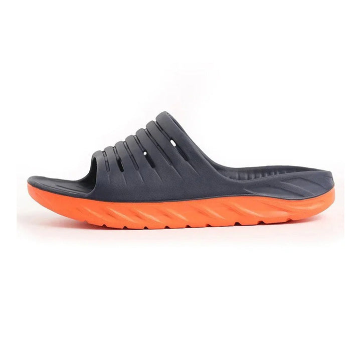 Supportive anti-slip unisex arch support slides for foot pain relief. Cushioned recovery footwear.
