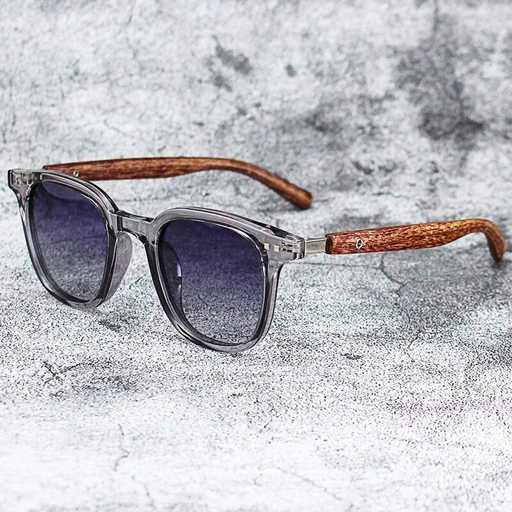 Unisex Arden sunglasses with stylish wood grain translucent frames, offering UV protection and glare reduction.