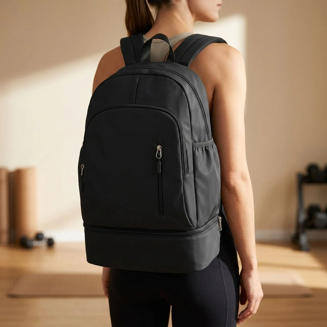 Unisex athletic backpack with a dedicated shoe pocket, perfect for sports gear and gym essentials.