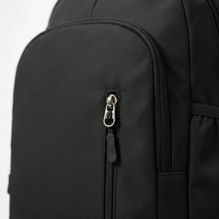 Gym bag: spacious athletic backpack with a separate shoe compartment for workout gear, keeping items organized.