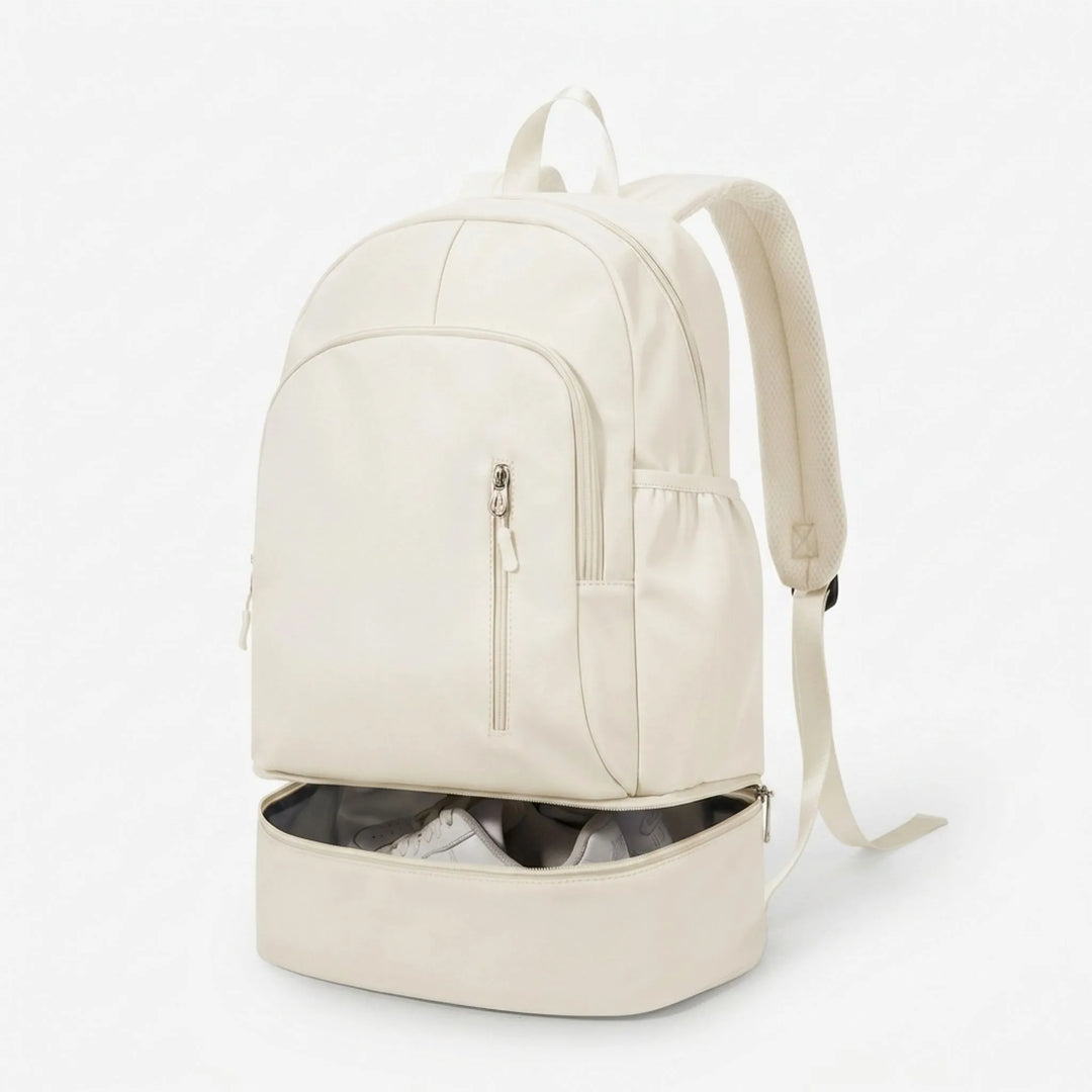 Stylish unisex athletic backpack featuring multiple pockets and a dedicated shoe compartment for superior organization.