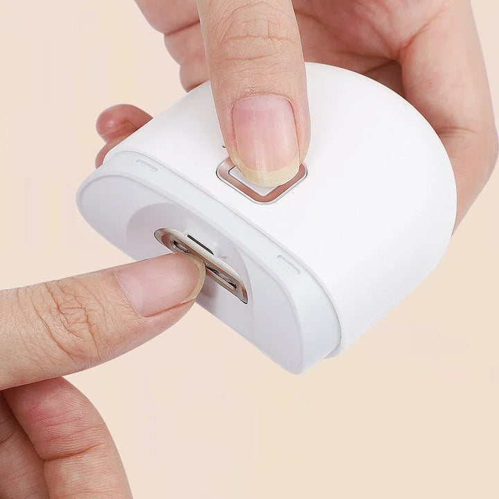 Unisex automatic electric nail clipper & polisher for safe, easy manicure and grooming.