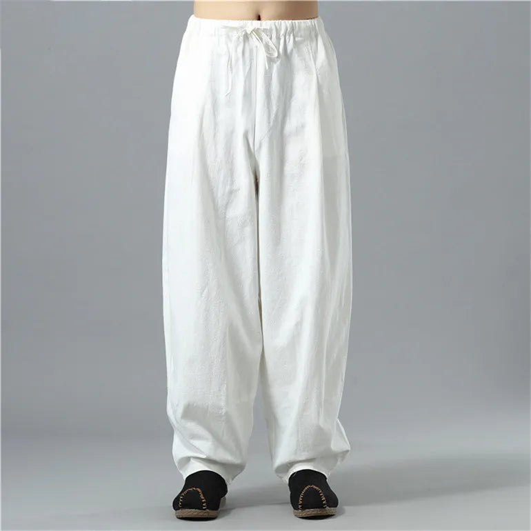 Side view: Unisex loose fit lounge pants, emphasizing flexible movement and ultimate comfort for lounge or street.