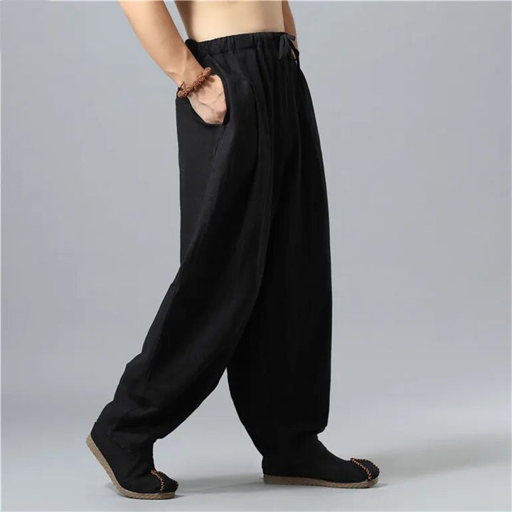 Comfortable unisex baggy lounge pants in flexible fabric, designed for relaxed, everyday style & movement.