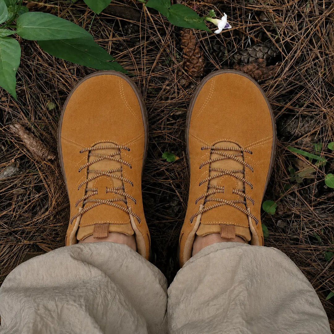 Ergonomic barefoot hiking trainers, wide toe box, zero drop for natural trail walking comfort.