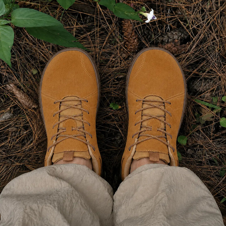 Ergonomic barefoot hiking trainers, wide toe box, zero drop for natural trail walking comfort.