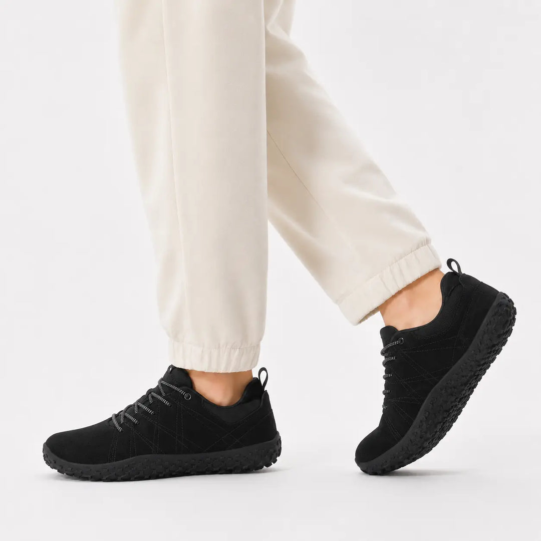Minimalist unisex hiking shoes, wide toe box, zero drop for natural outdoor trail movement.