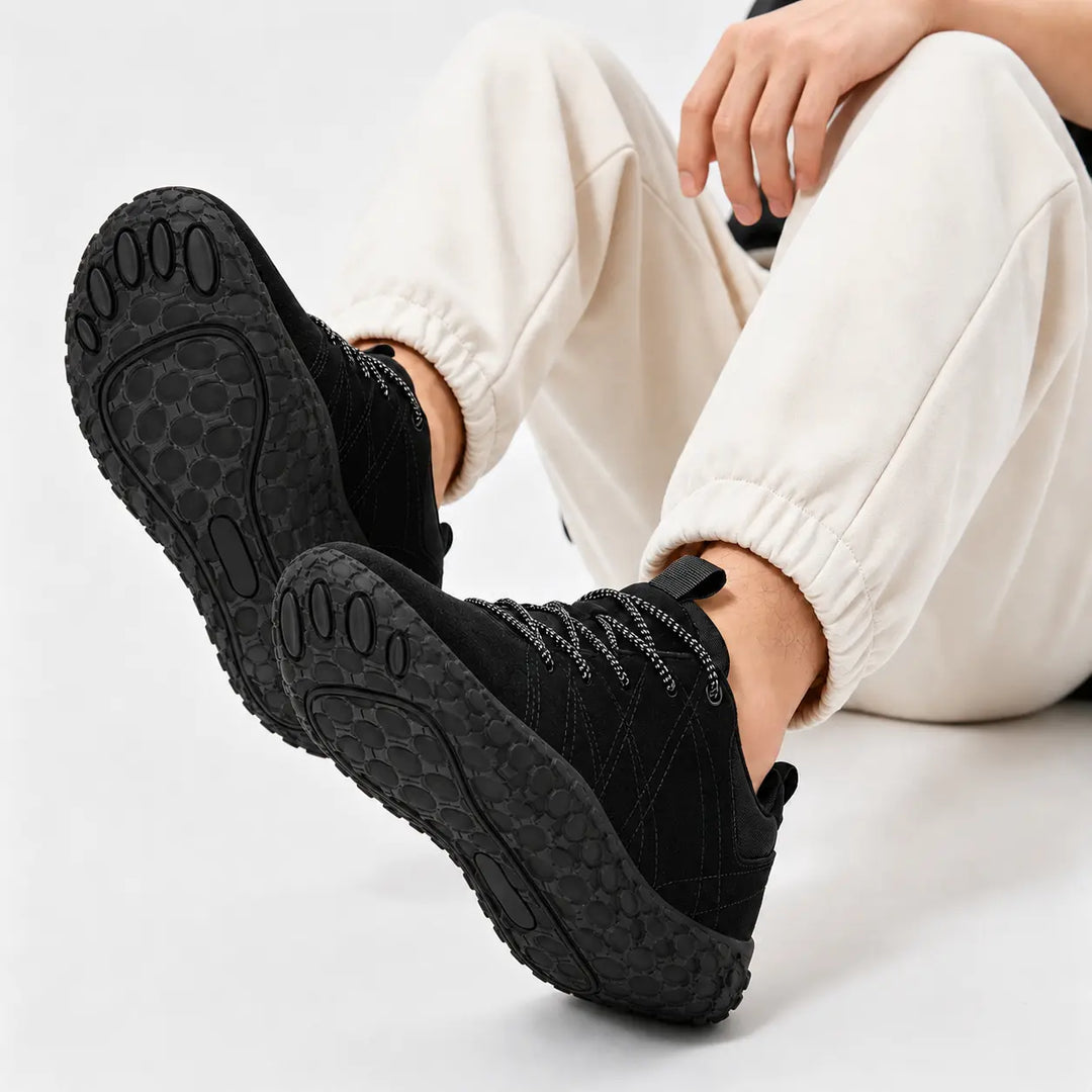 All-terrain barefoot hiking trainers, wide toe box, flexible sole for natural movement & grip.