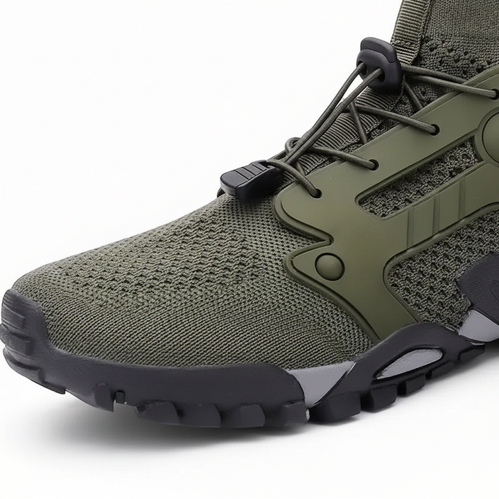 Close-up of the non-slip sole on unisex high-shaft trekking shoes by 'Cameron', quick-dry design