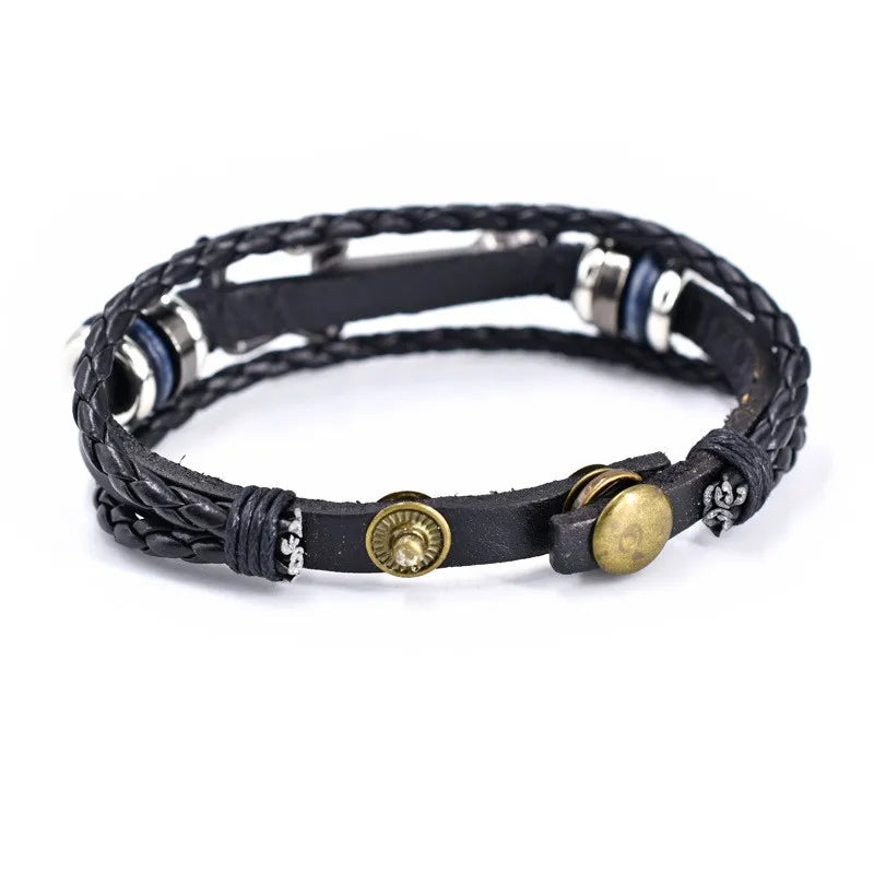 Vintage black leather bracelet featuring a detailed bass guitar charm, a unisex accessory for music enthusiasts.