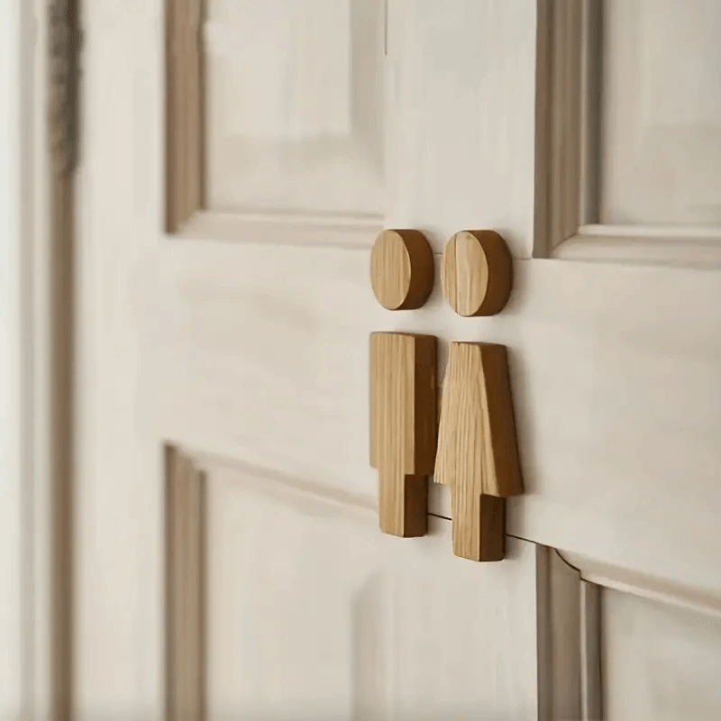 OakMarker bathroom decor wood sign showing 'Unisex' symbol, stylish and functional