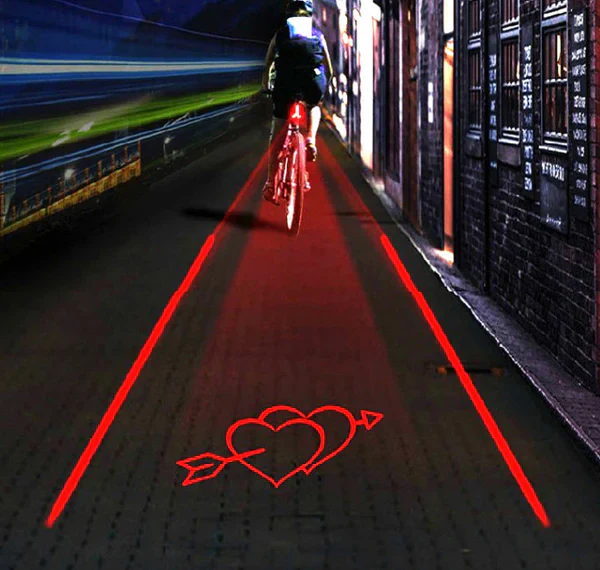 Unisex bicycle laser tail light with bike lane projection for enhanced night riding safety & road visibility.