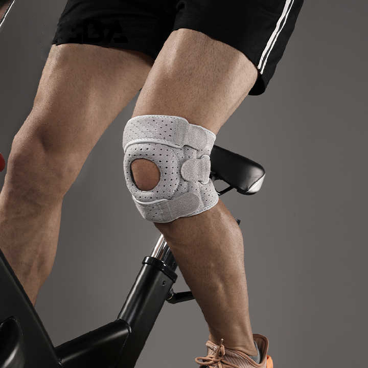 Grey biomechanical knee brace for pain relief & support, adjustable for osteoarthritis, recovery & active wear.