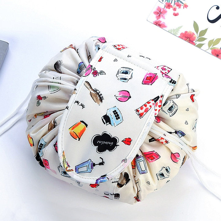 Closed unisex portable drawstring toiletry bag with items packed, suitable for travel