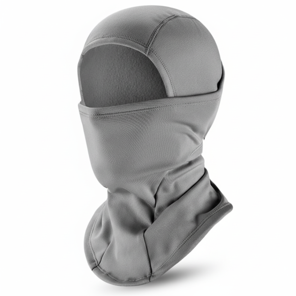 Green unisex fleece beanie modeled on a person, showing fit for ski and cold outdoor use.