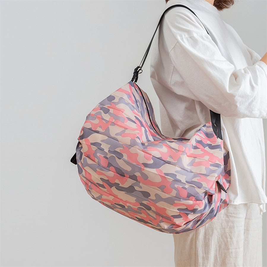 Large capacity foldable tote bag with comfortable handles, designed for unisex use, suitable for groceries and more.