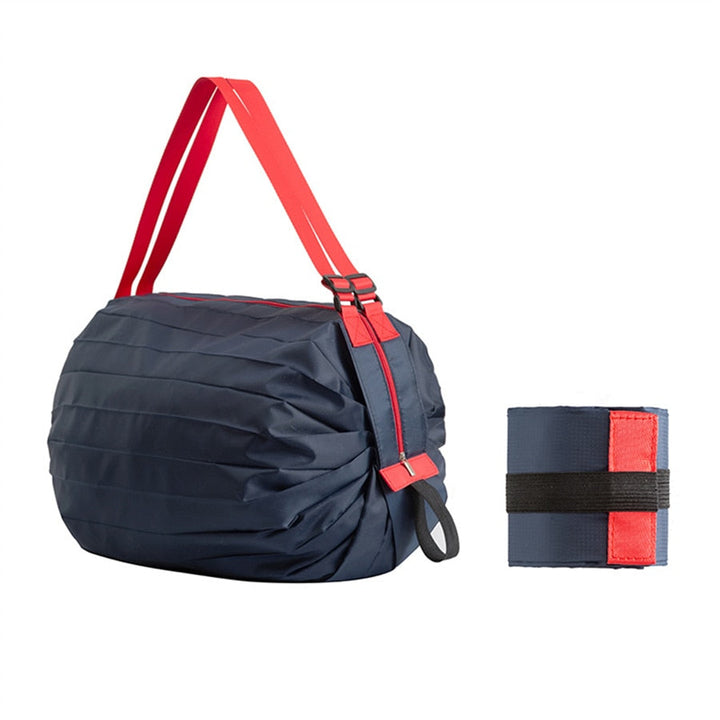 Foldable tote bag in a bright red, emphasizing its reusable and eco-friendly features for convenient shopping trips.