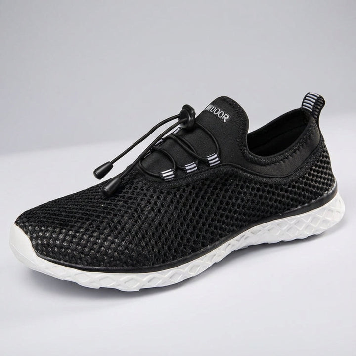 Pair of lightweight unisex 'Norman' mesh sneakers, front view, highlighting the breathable fabric and lace-up design.