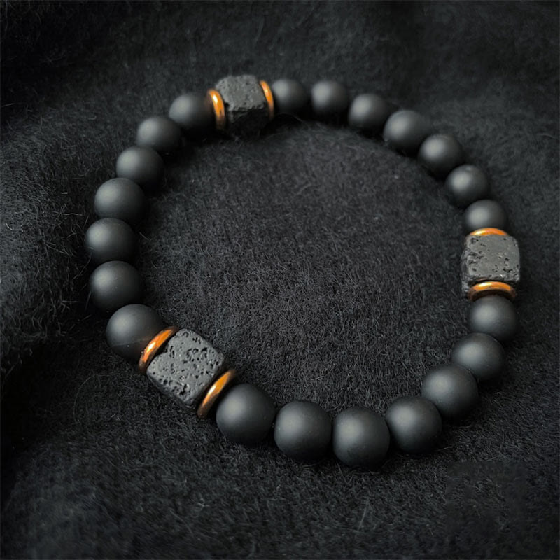 Unisex black onyx & lava stone cube balance bracelet, a minimalist strength and protection charm.