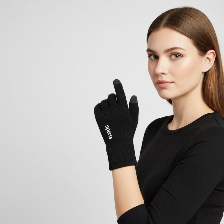 Pair of black unisex gloves with warm fleece lining, essential winter accessories for hand protection.