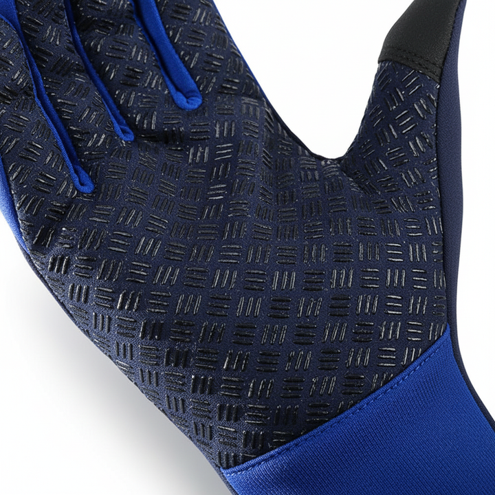 Close-up of a black thermal glove highlighting the specialized grip pattern and touchscreen capability.