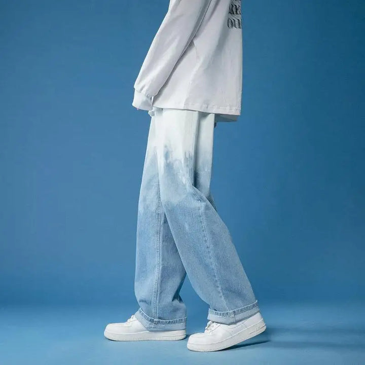 Comfortable unisex wide-leg fade jeans with unique bleach-dye, perfect for casual fashion.