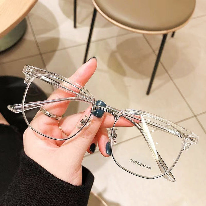 Sleek metal & PC half-rim blue light blocking glasses, designed for comfortable vision care and style.