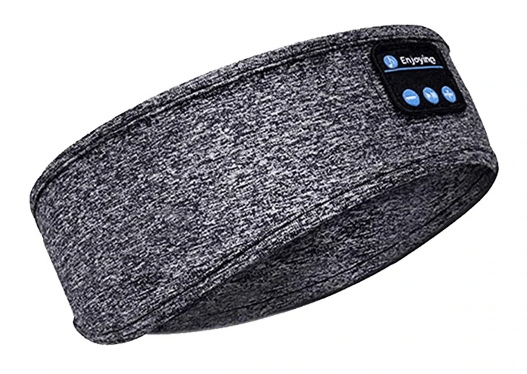 Person wearing a unisex Bluetooth sleep mask, relaxing. Soft audio eye mask for meditation.