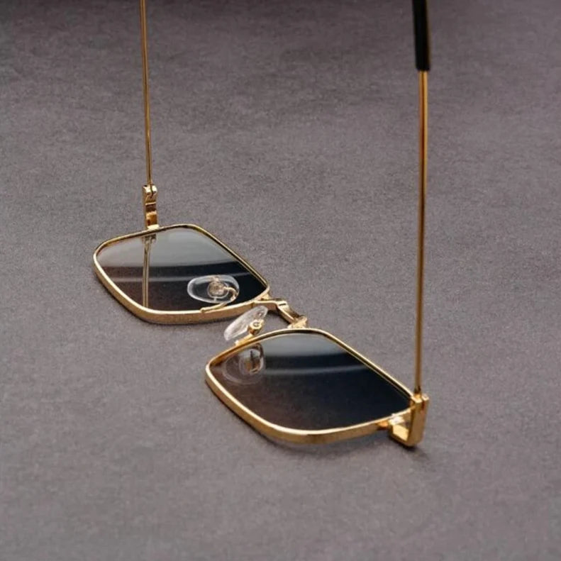 Modern bold rectangular sunglasses, unisex design, offering stylish eye protection.