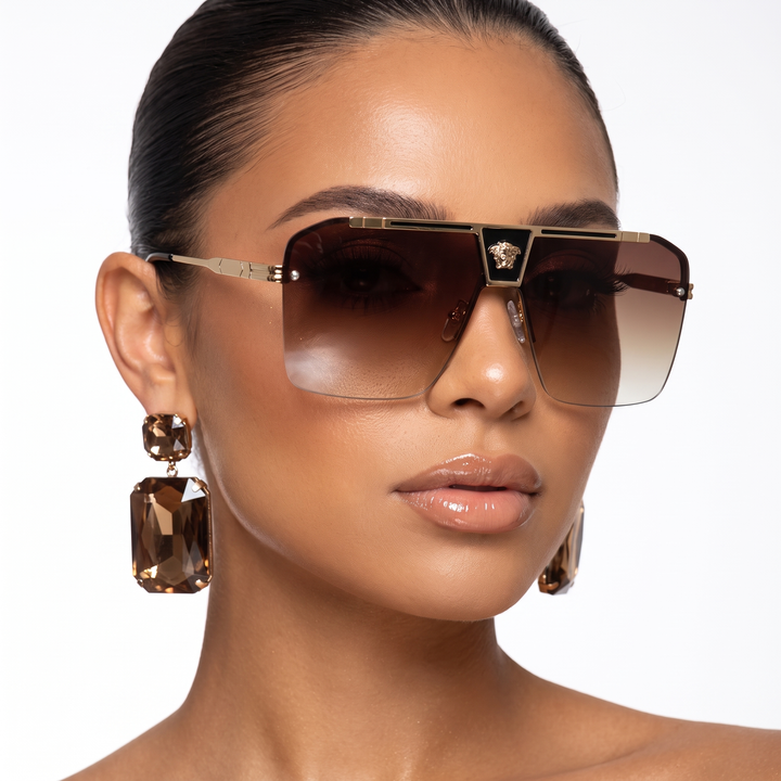 Modern unisex rectangular sunglasses, offering bold style & full UV protection.