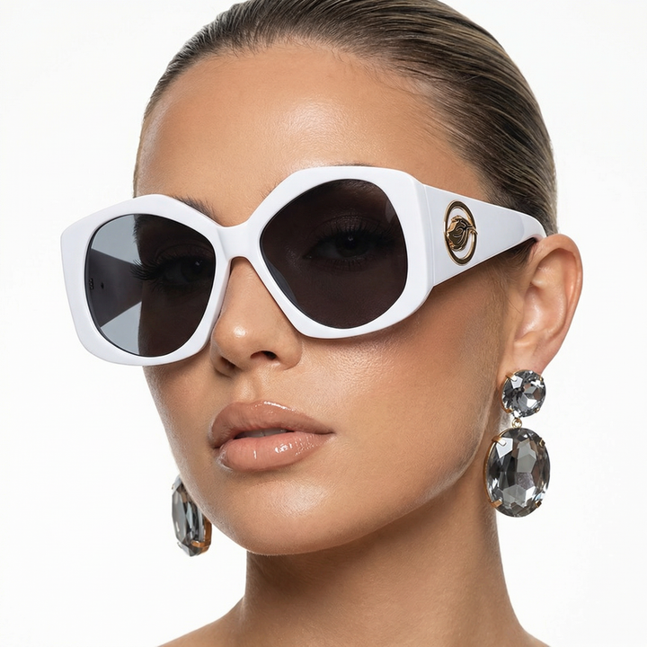 Bold red rhombus sunglasses. Vibrant fashion eyewear with unique geometric frames for a trendy appeal.