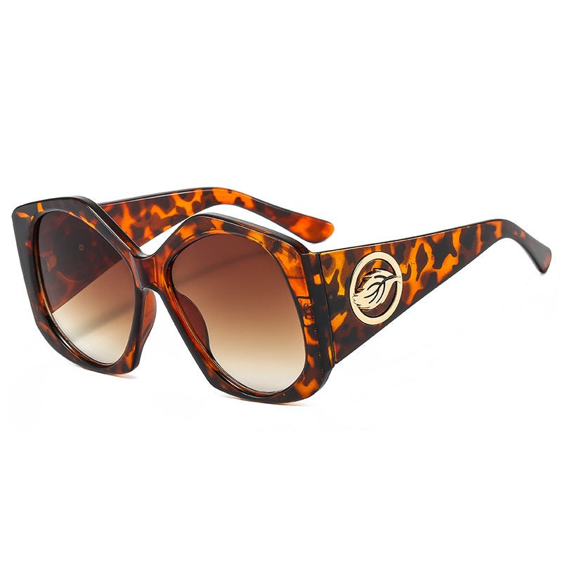 Statement rhombus eyewear with clear frames. Modern geometric sunglasses for a unique look.
