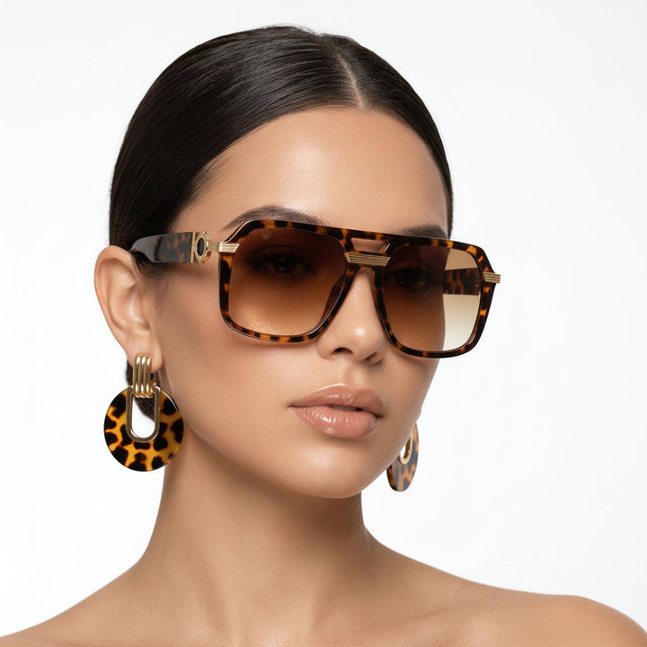 Unisex bold square sunglasses with UV400 protection, featuring a stylish, modern frame.