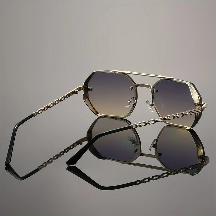 Fashionable unisex sunglasses with UV400 protection, offering clear vision & a bold look.