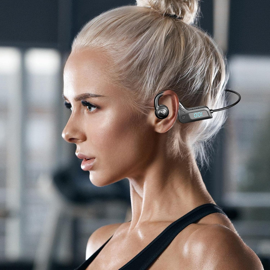 Close-up of Audyra bone conduction headphones, showing ergonomic open-ear fit for active lifestyle