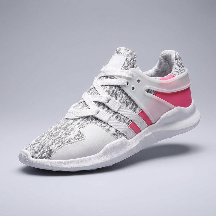 Athletic sneakers for all genders with breathable upper and sturdy rubber sole for daily comfort.