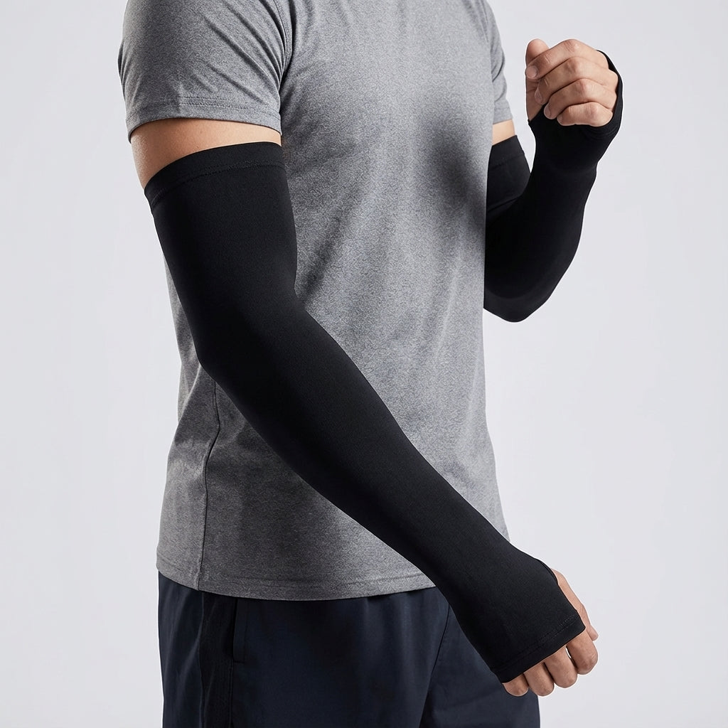 Pair of athletic cooling arm sleeves in white, ideal for outdoor sports and UV protection.